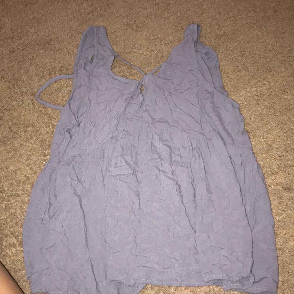 Cute tank top and it ties in the back!!